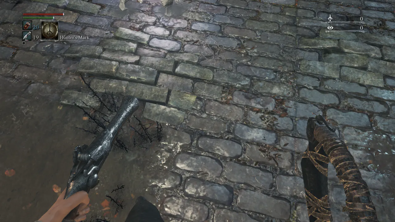 First-person head camera view looking down at wet cobblestones, with a pistol in the left hand and a wrapped weapon handle in the right.