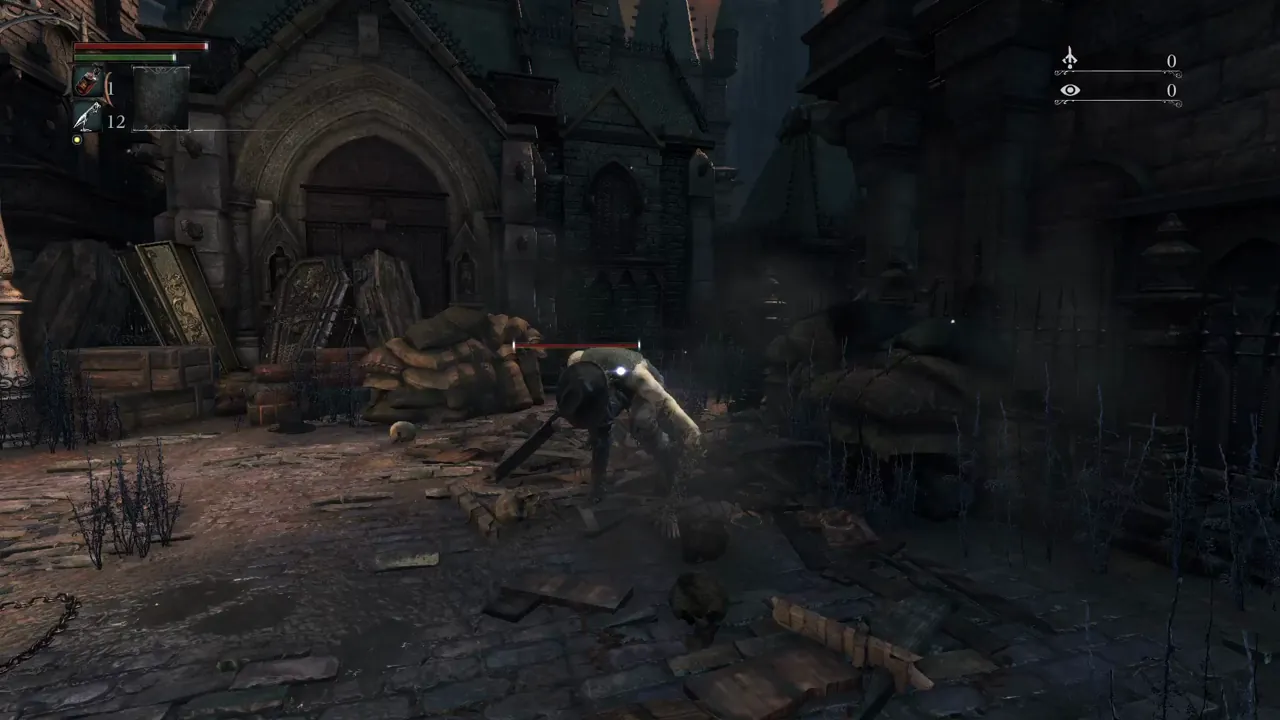 First-person view in Yharnam facing the first enemy near the crates, with its health bar and the lock-on marker visible; the video is not supported by this browser